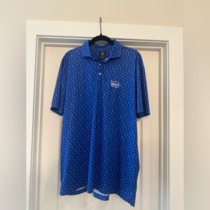Vibrant Blue Polo Shirt with Geometric Pattern